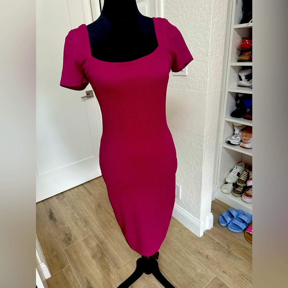 A mid-length square neck purple dress